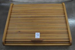 A David Linley tambour fronted tabletop writing desk, stamped Linley with original box.