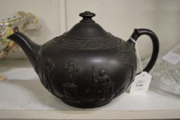 A Wedgwood black basalt teapot.