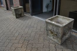 A good pair of reconstituted stone square shaped planters.