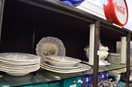 Large quantity of fruit decorated dinnerware to include a large tureen, cover and stand.