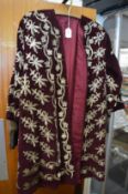 A Middle Eastern embroidered coat.