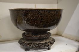 A cloisonne bowl on stand.