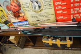 A pair of ski's and ski poles.