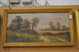 Goodwin, a figure standing by a stile in a rural landscape, oil on canvas.