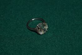 A very good diamond solitaire ring with white metal mount, the diamond measuring 4.8 carats.
