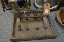 A Victorian cast iron boot scraper.