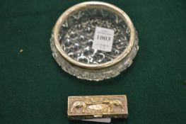 A silver mounted cut glass dish and a pill box.