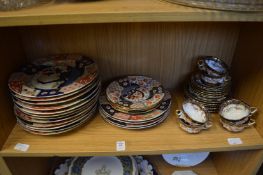 A quantity of Wedgwood Imari patterned china and similar cups and saucers.