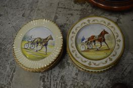 A quantity of decorative plates.