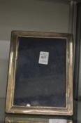 A silver photograph frame.