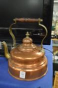 A copper kettle.