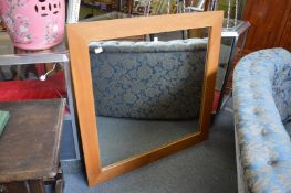 A modern oak framed mirror.
