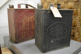 Two old petrol cans.