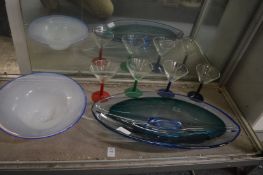 A stylish boat shaped Kosta Boda glass dish and other items.