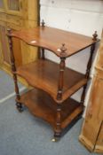 A Victorian mahogany three-tier whatnot.