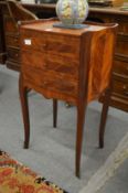 A good pair of French king wood three drawer bedside chests.