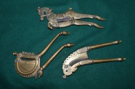 Three early brass and steel Islamic betel nut cutters.