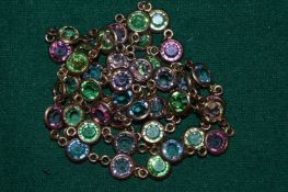 A multi-coloured stone necklace.