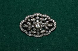 A decorative paste brooch.