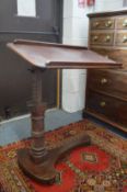 A Victorian mahogany adjustable bed table.