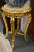 A pair of gilt wood and marble inset vase stands.