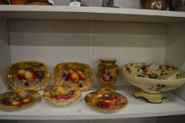 A group of Royal Worcester fruit decorated porcelain and a decorative pedestal bowl.