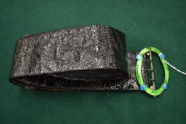 Ladies belt with decorative enamel buckle (some damage).