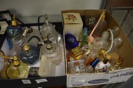 A good collection of scent bottles and atomisers.