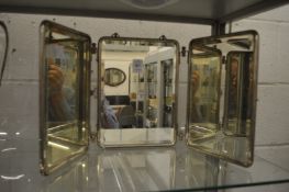 A mid century barbers shop folding mirror.