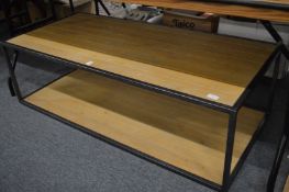 An industrial style two-tier coffee table.