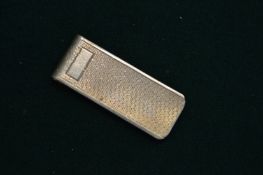 A silver money clip.