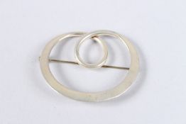 A SILVER BROOCH.