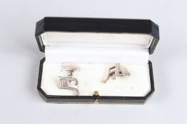 A PAIR OF HARRODS MUSICAL INSTRUMENT CUFFLINKS.
