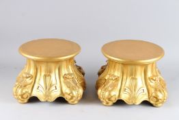 A GOOD PAIR OF LOUIS XVITH STYLE CARVED AND GILDED CIRCULAR STANDS. 9ins high x 10.5ins diameter.