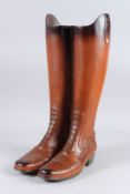 A BOOT STICK STAND. 19ins high.