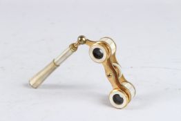 A PAIR OF MOTHER-OF-PEARL OPERA GLASSES.