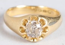 AN 18CT GOLD GYPSY RING.