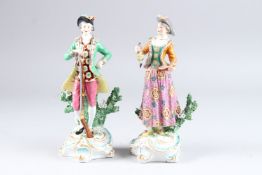A PAIR OF SAMSON CHELSEA DERBY FIGURES OF A GALLANT AND A LADY, the man with a gun the lady with a