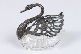A SILVER AND GLASS SWAN. 4ins long.