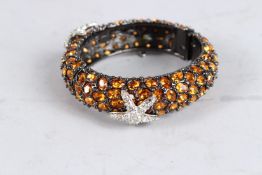 A KENNETH LANE VINTAGE GEM SET AND STAR BRACELET. 2.75ins.