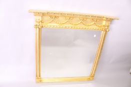 A RECTANGULAR GILTWOOD OVER-MANTLE MIRROR, with ribbon and bow frieze, column sides. 3ft 11ins