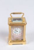 A MINIATURE SEVRES CARRIAGE CLOCK. 2ins high.