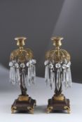 A VERY GOOD PAIR OF REGENCY GILT BRONZE LUSTRES with glass drops. 12ins high.