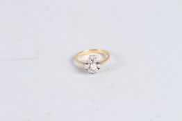 AN 18CT GOLD DIAMOND RING. Ring size N.