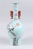 A CHINESE PORCELAIN VASE painted with birds. 14ins high.