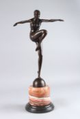 AFTER J PHILIPP. A PATINATED BRONZE FIGURE OF AN ART DECO DANCER, on a circular marble base. 22ins
