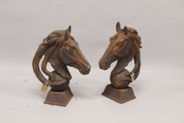 A LARGE PAIR OF IRON HORSES. 2ft 2ins high.
