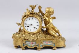 A GOOD 19TH CENTURY LOUIS XVITH GILT METAL AND PORCELAIN CLOCK, with cupids, birds and porcelain