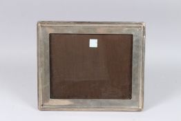 A LARGE SILVER PHOTOGRAPH FRAME. 13ins x 11ins. Birmingham.
