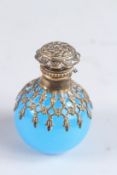A BLUE GLASS SILVER TOP SCENT BOTTLE.